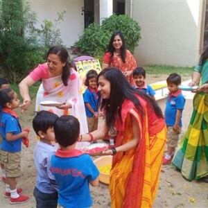 Students celebrating Holi festival at school