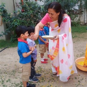 Students celebrating Holi festival at school