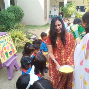 Students celebrating Holi festival at school