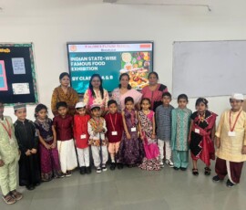 Class 1 students presenting Indian state-wise famous food exhibition