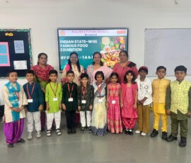 Class 1 students presenting Indian state-wise famous food exhibition